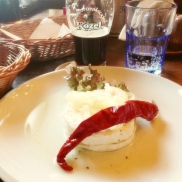 Have a beer and some typical Bohemian food such as pickled cheese